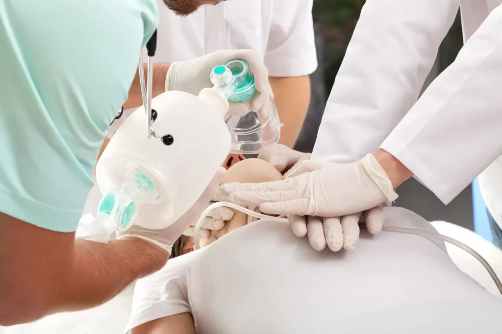 A group of doctors are holding instruments in their hands.