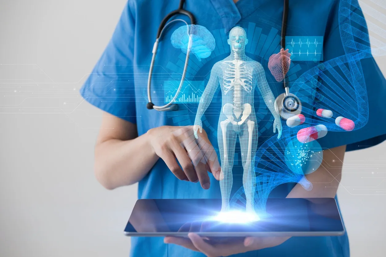 A doctor is holding an interactive tablet.